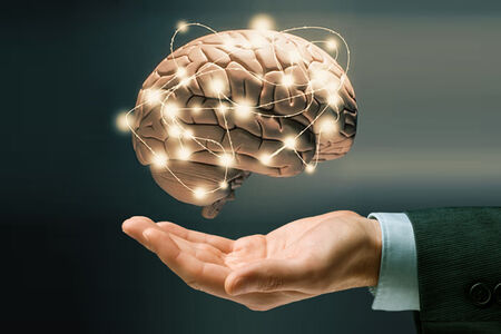 businessman holding emotional intelligence map