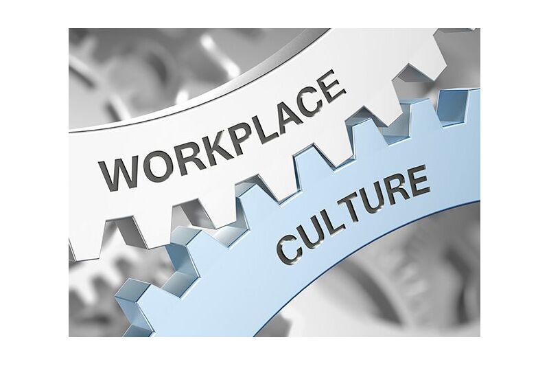 Close-up of two interlocking gears labeled ‘Workplace’ and ‘Culture,’ symbolizing how organizational culture and workplace success are interconnected.