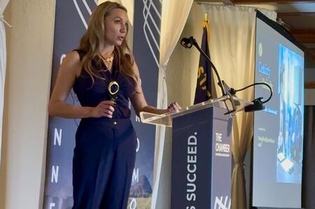 female speaker on stage